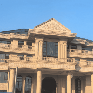 郑州黄金麻别墅外墙干挂石材效果示例