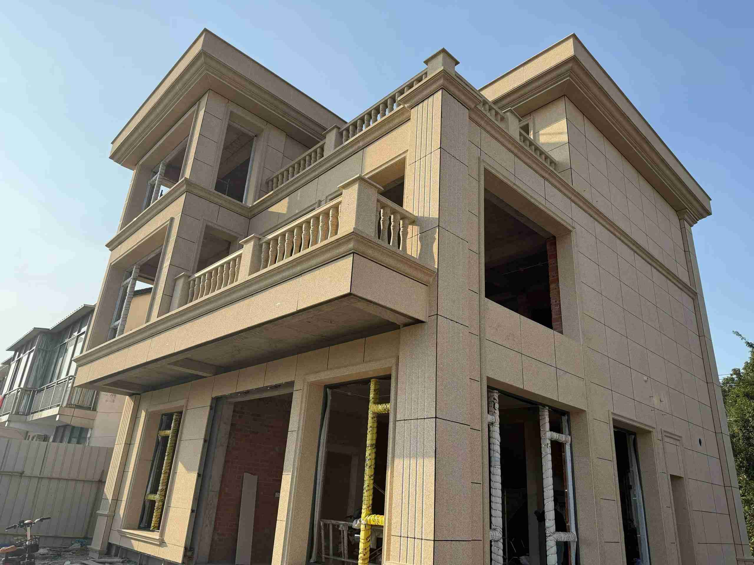 郑州 黄金麻花岗岩石材荔枝面外墙干挂效果展示